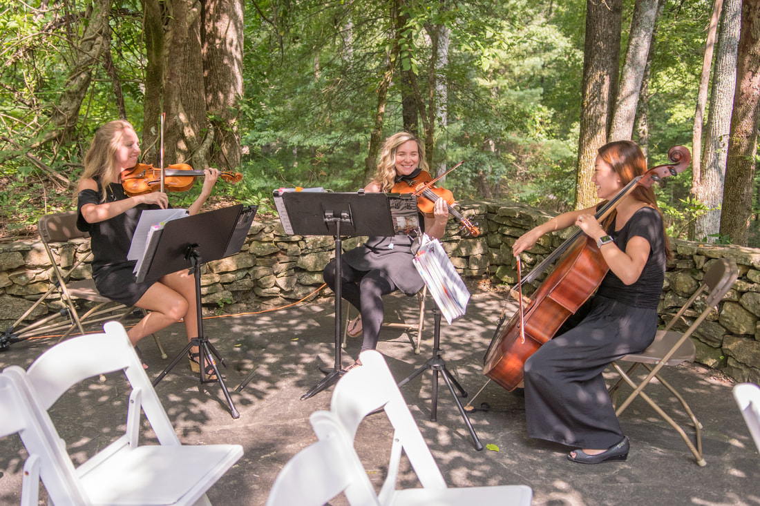 Amber Hobbs and Cobalt Strings string trio playing a wedding at Big Canoe